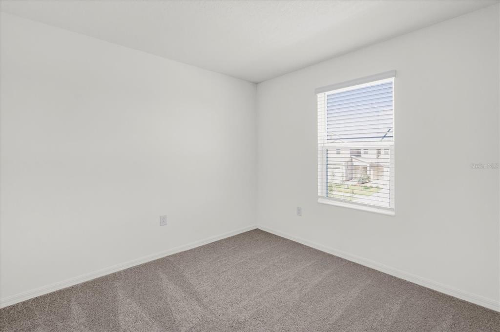 375 Sequoia Drive Lake Wales, FL 33859 - Photo 11 of 16 an empty room with a window