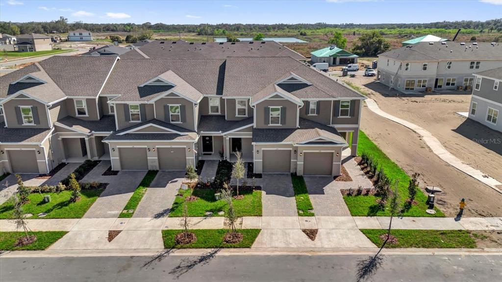 375 Sequoia Drive Lake Wales, FL 33859 - Photo 13 of 16 an aerial view of a house with a garden and plants