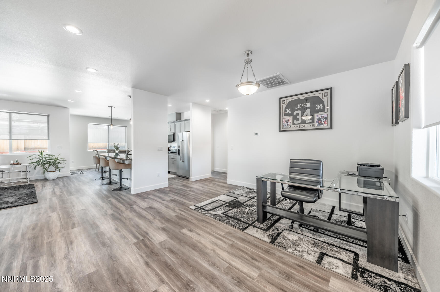 785 Garnet Way Fernley, NV 89408 - Photo 17 of 33 a view of a workspace with furniture and a kitchen