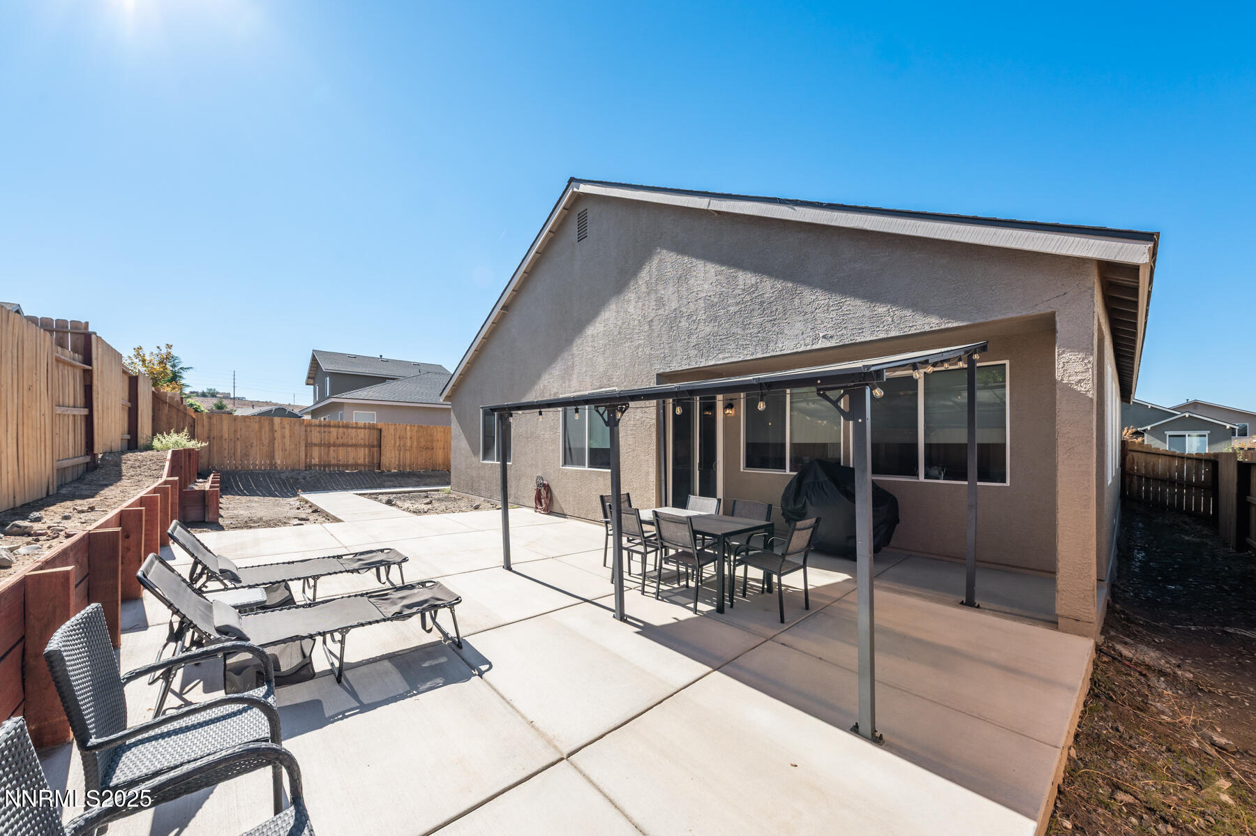 785 Garnet Way Fernley, NV 89408 - Photo 26 of 33 a terrace with outdoor seating and city view