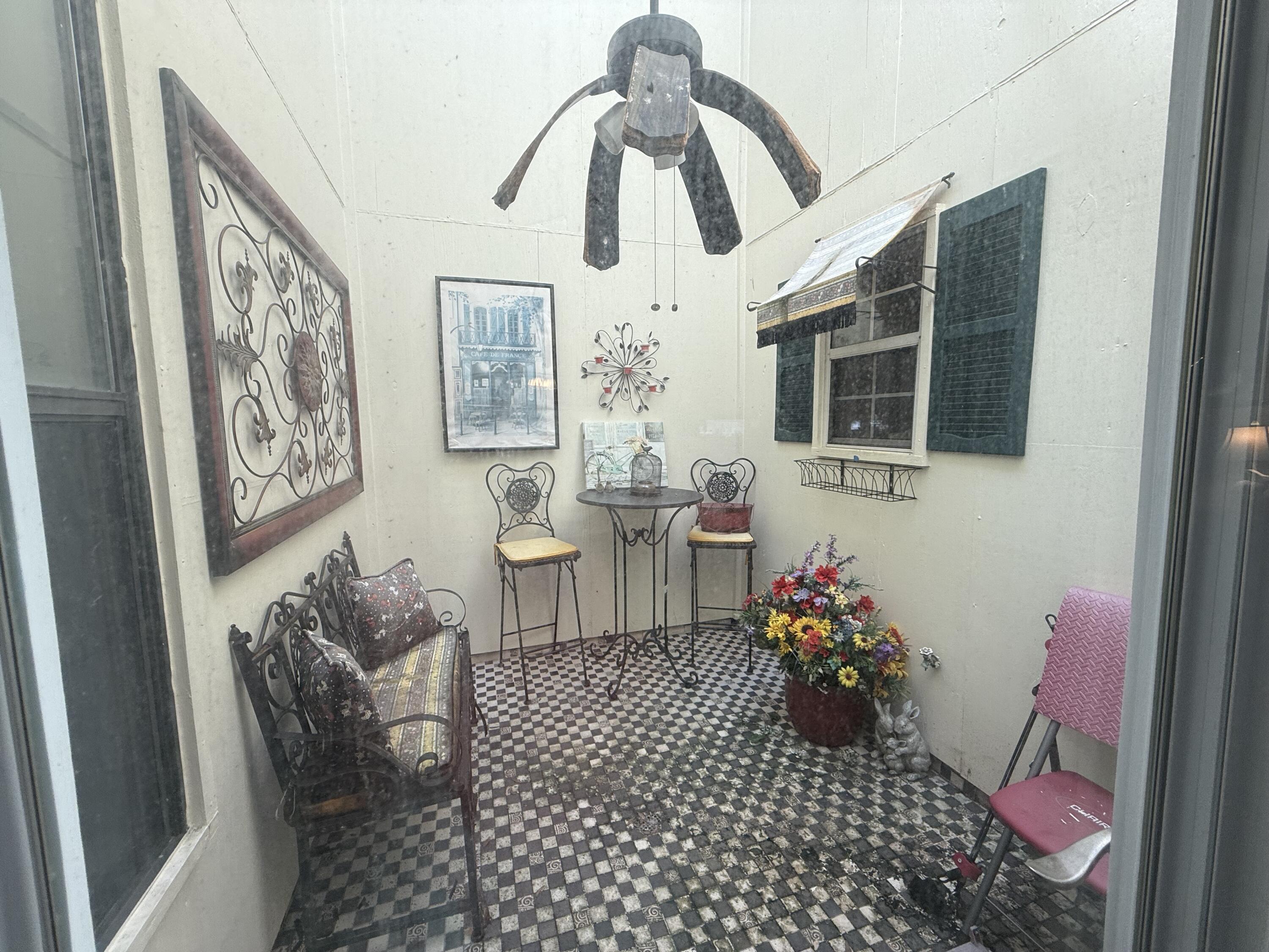 43 12th Avenue Shalimar, FL 32579 - Photo 17 of 17 a living room with furniture and a chandelier