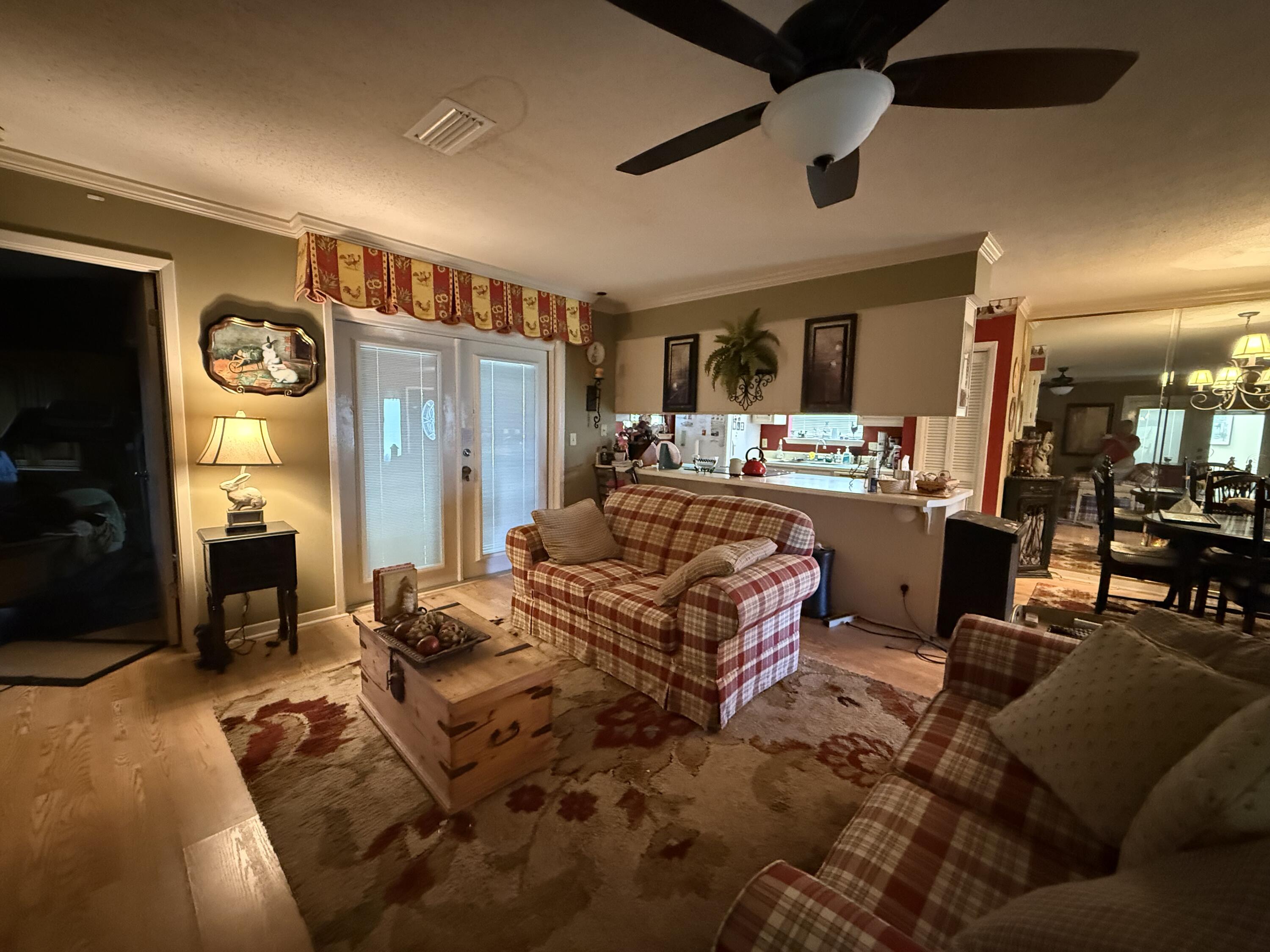 43 12th Avenue Shalimar, FL 32579 - Photo 3 of 17 a living room with furniture and a large window