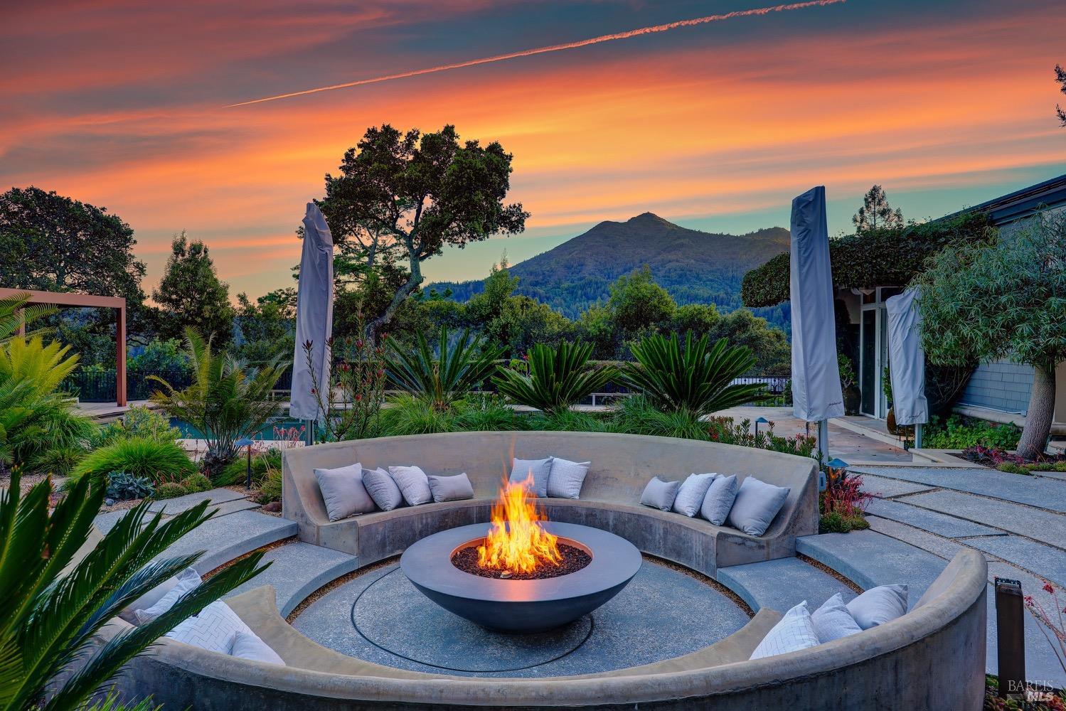 69 Rock Road Kentfield, CA 94904 - Photo 1 of 1 a view of a patio with a table chairs and a fire pit