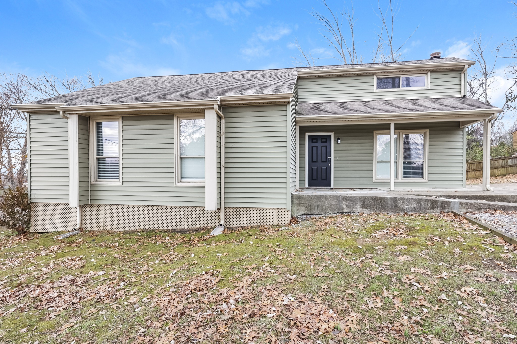 405 Montego Cove Hermitage, TN 37076 - Photo 1 of 16 a front view of a house with garden