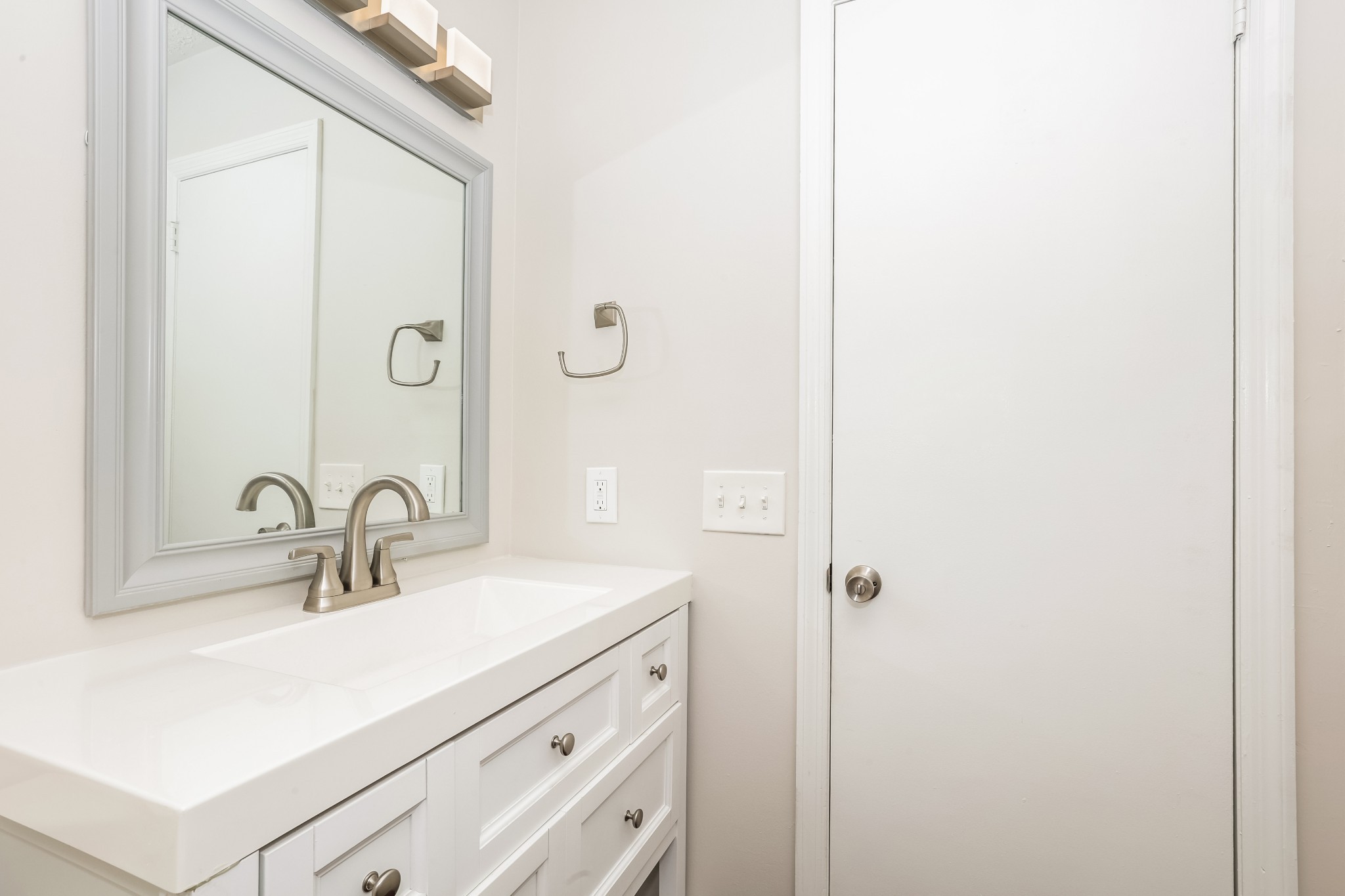 405 Montego Cove Hermitage, TN 37076 - Photo 11 of 16 a bathroom with a sink and a mirror