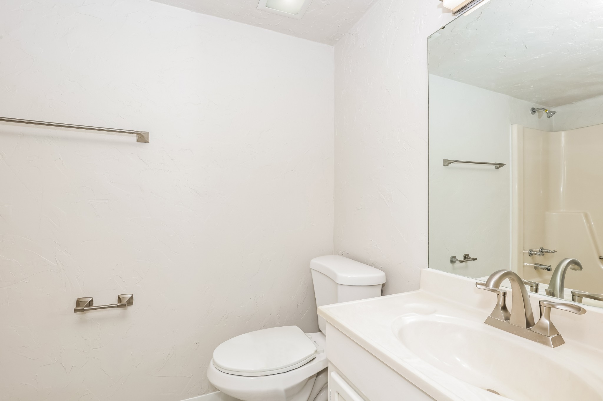 405 Montego Cove Hermitage, TN 37076 - Photo 10 of 16 a bathroom with a sink a toilet and mirror
