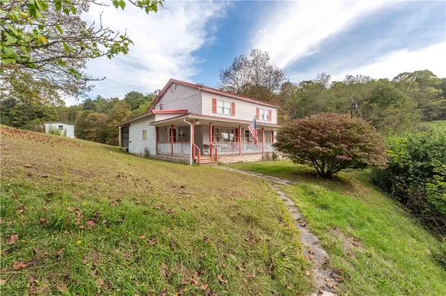 a house view with a garden space