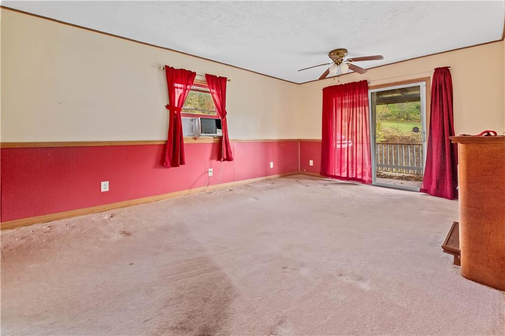 322 Wilson Road Mount Morris, PA 15349 - Photo 11 of 26 a view of empty room with windows