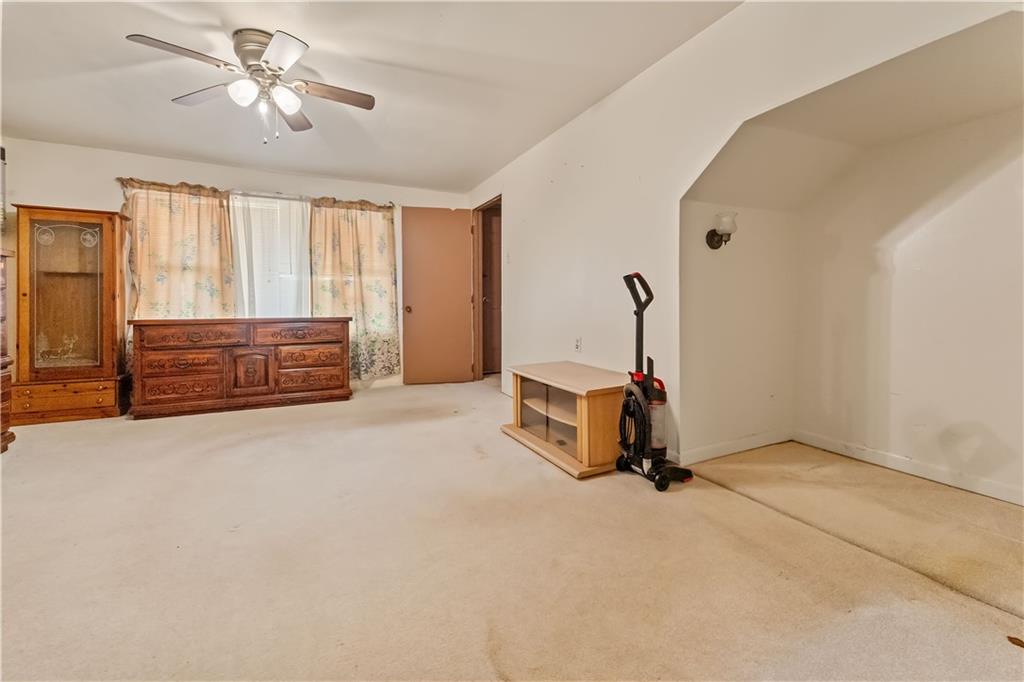 322 Wilson Road Mount Morris, PA 15349 - Photo 16 of 26 a room with gym equipment and windows