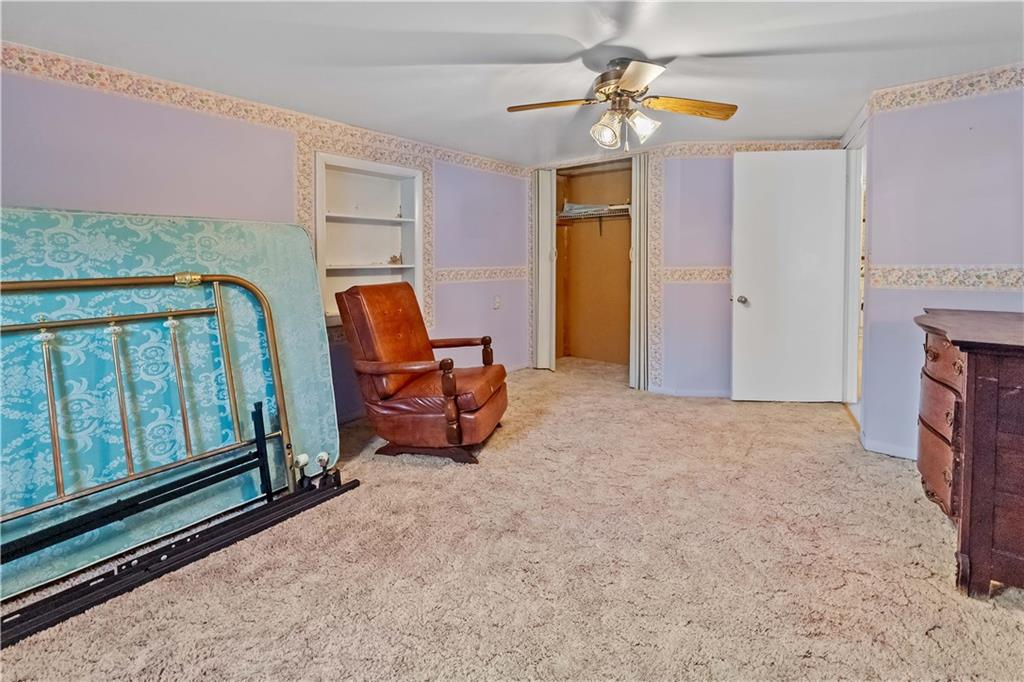 322 Wilson Road Mount Morris, PA 15349 - Photo 21 of 26 a view of livingroom with furniture and staircase