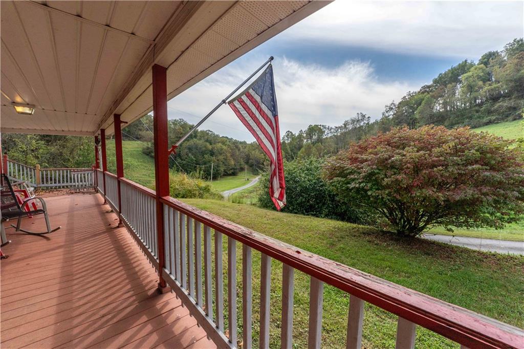 322 Wilson Road Mount Morris, PA 15349 - Photo 3 of 26 a view of a wooden deck next to a yard