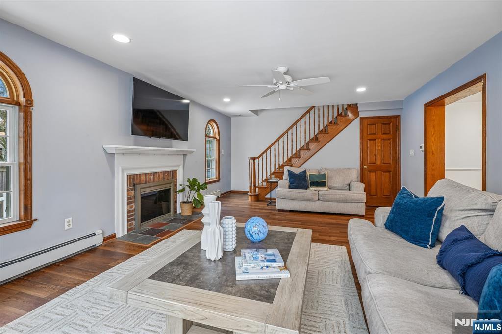 40 Golf Road Bloomfield, NJ 07003 - Photo 20 of 50 a living room with furniture fireplace and flat screen tv