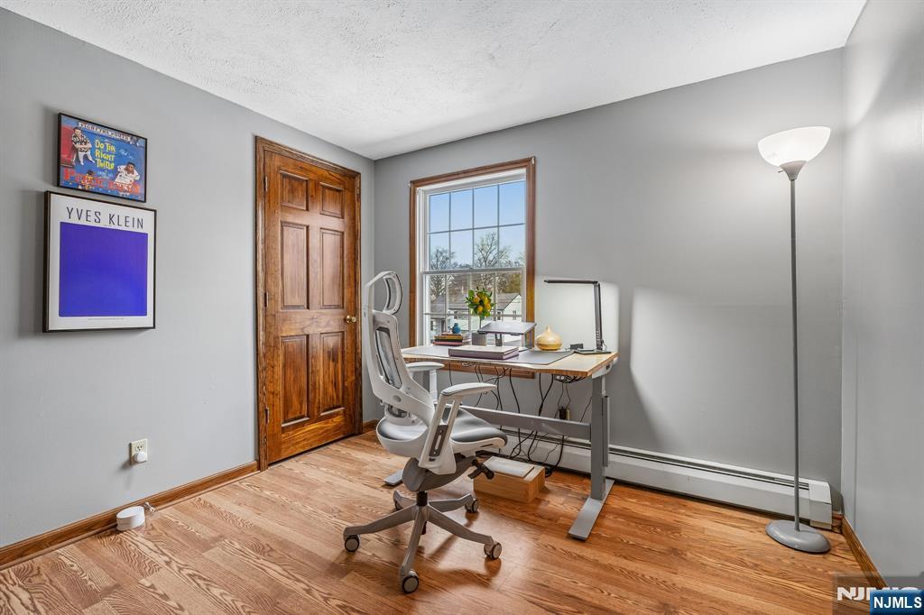 40 Golf Road Bloomfield, NJ 07003 - Photo 27 of 50 a view of a workspace with furniture and a window