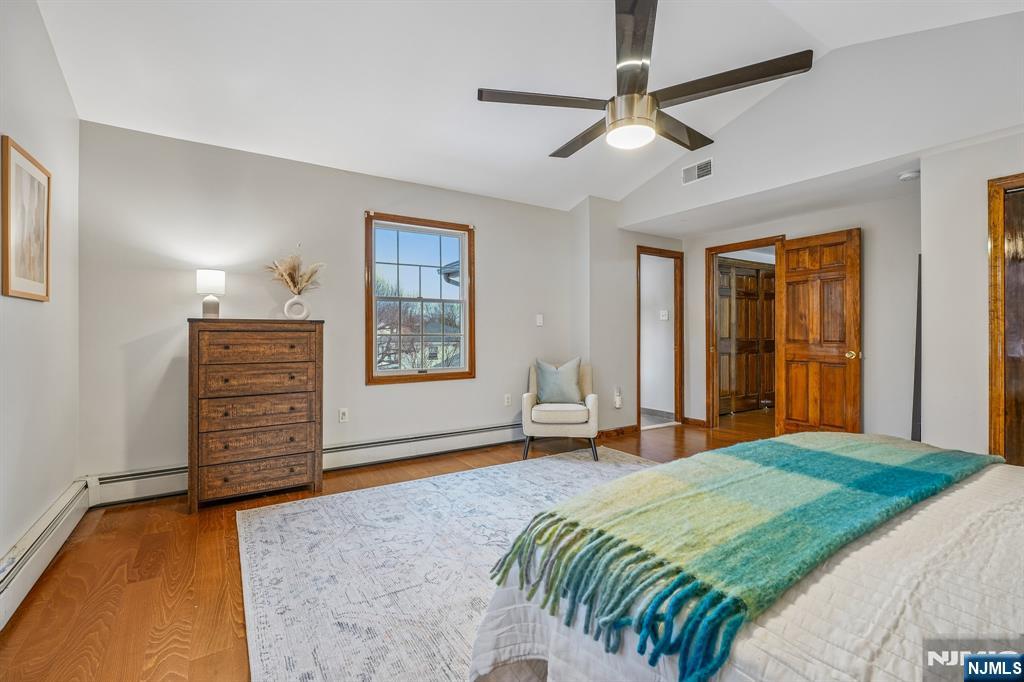40 Golf Road Bloomfield, NJ 07003 - Photo 31 of 50 a bedroom with a bed dresser and a window