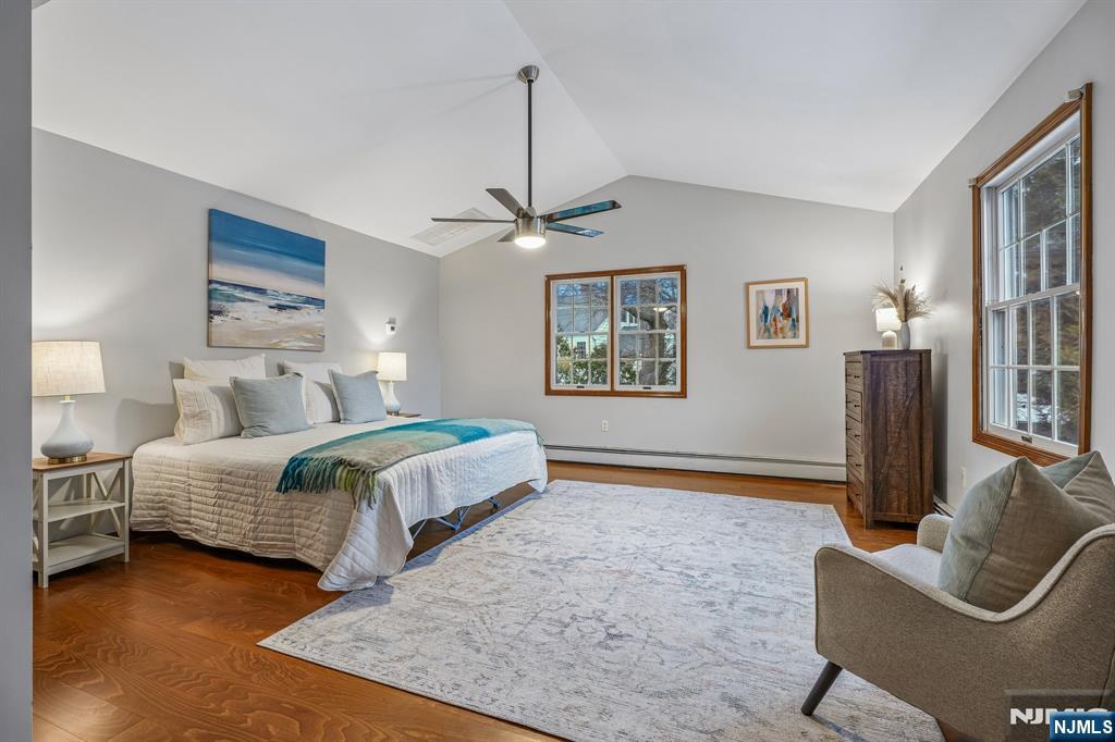 40 Golf Road Bloomfield, NJ 07003 - Photo 33 of 50 a bedroom with a bed couches and window