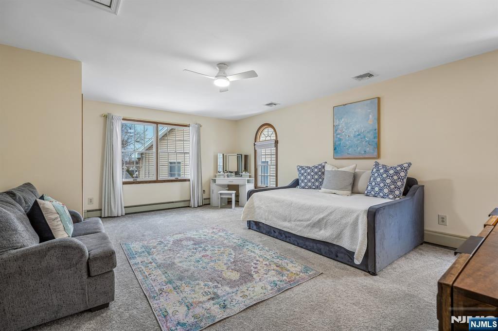 40 Golf Road Bloomfield, NJ 07003 - Photo 35 of 50 a living room with furniture and a window