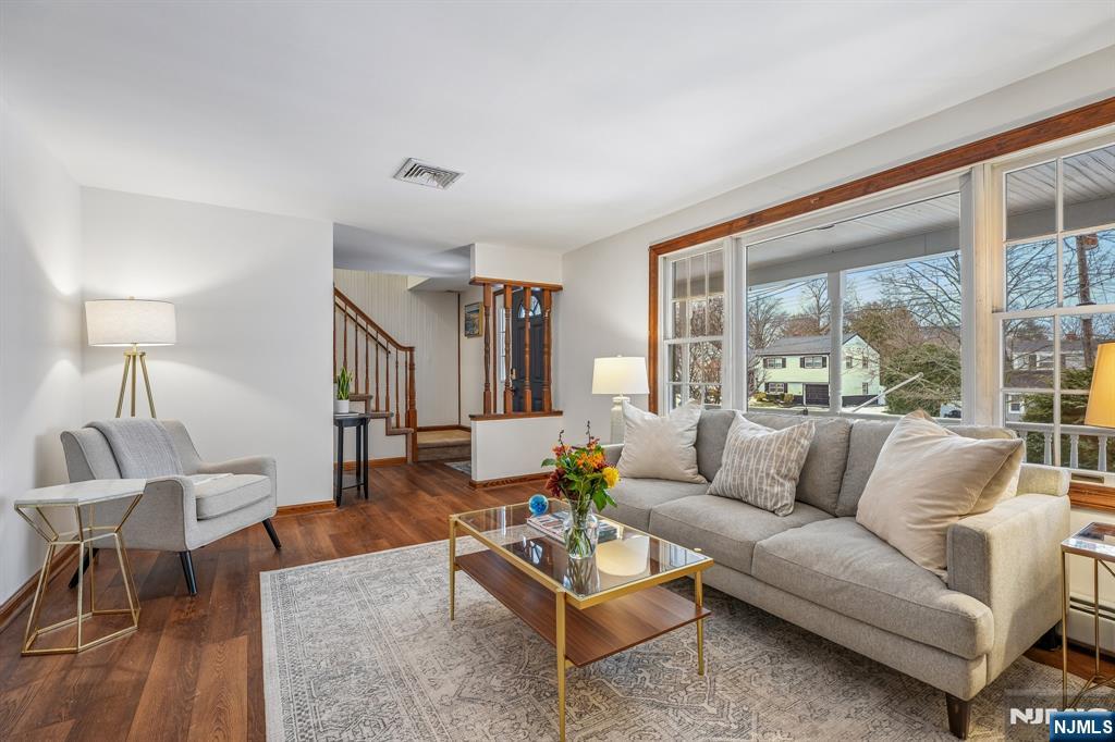 40 Golf Road Bloomfield, NJ 07003 - Photo 5 of 50 a living room with furniture and a large window