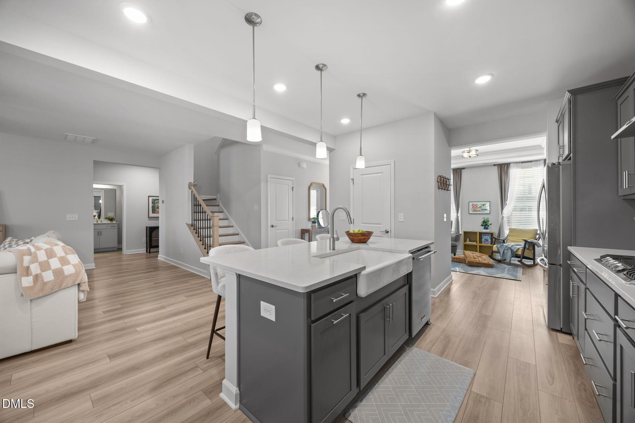 321 Pond Overlook Court Knightdale, NC 27545 - Photo 11 of 41 a kitchen with sink stove and wooden floor
