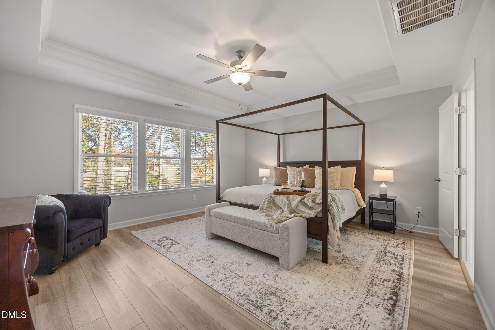 321 Pond Overlook Court Knightdale, NC 27545 - Photo 21 of 41 a bed room with furniture and a chandelier