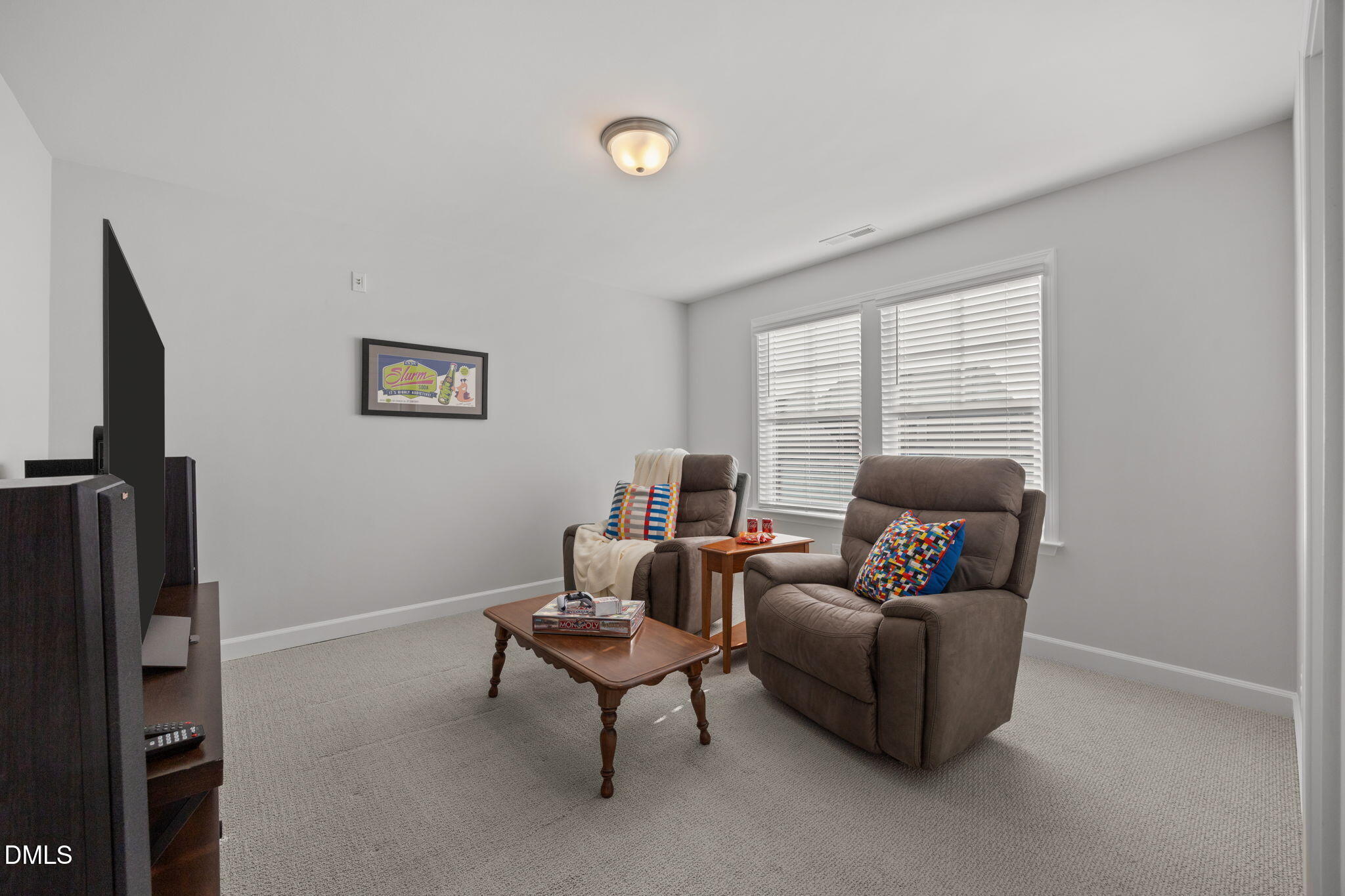 321 Pond Overlook Court Knightdale, NC 27545 - Photo 28 of 41 a living room with furniture and a window