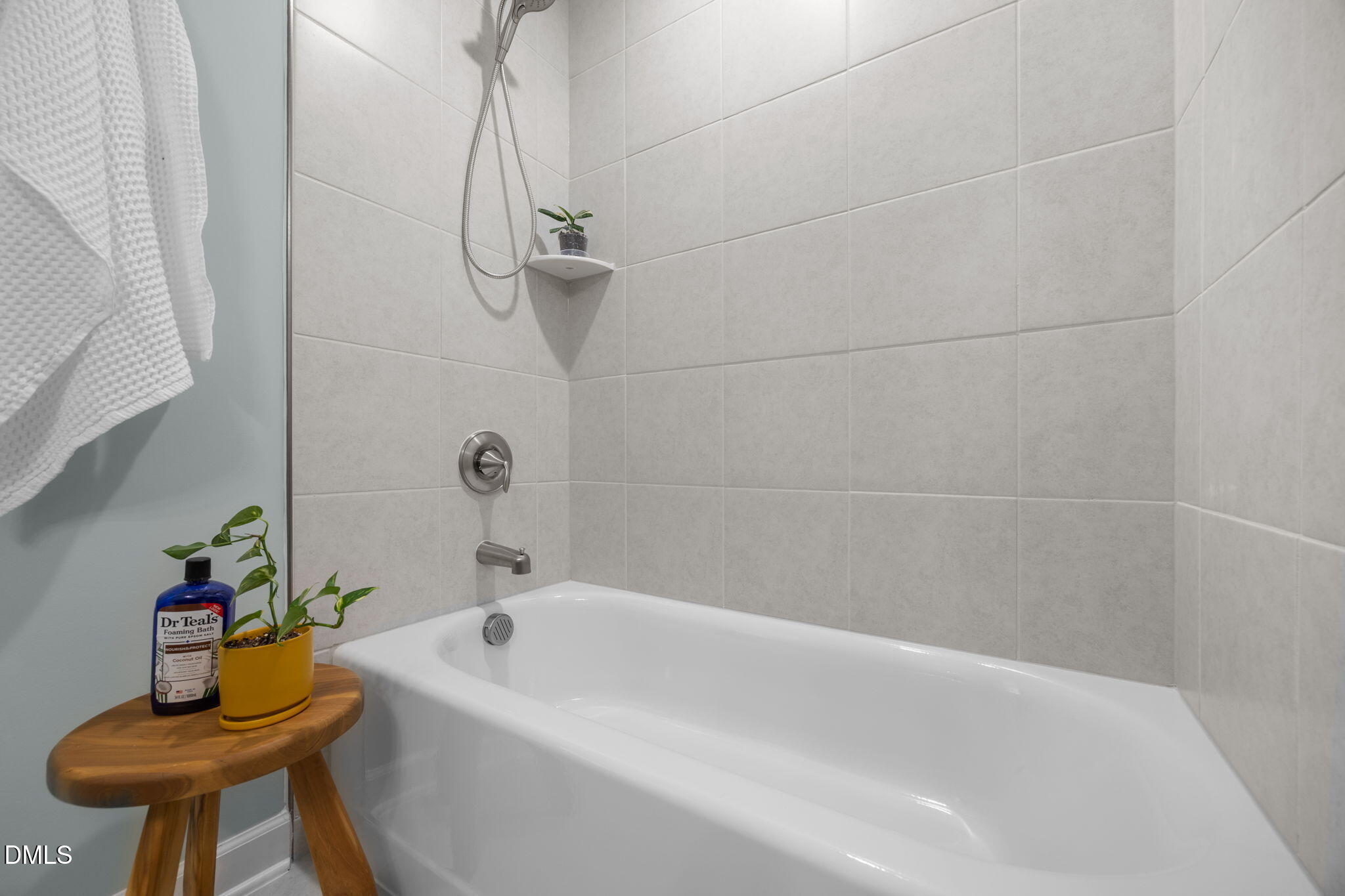 321 Pond Overlook Court Knightdale, NC 27545 - Photo 31 of 41 a bathroom with a bath tub with a shower