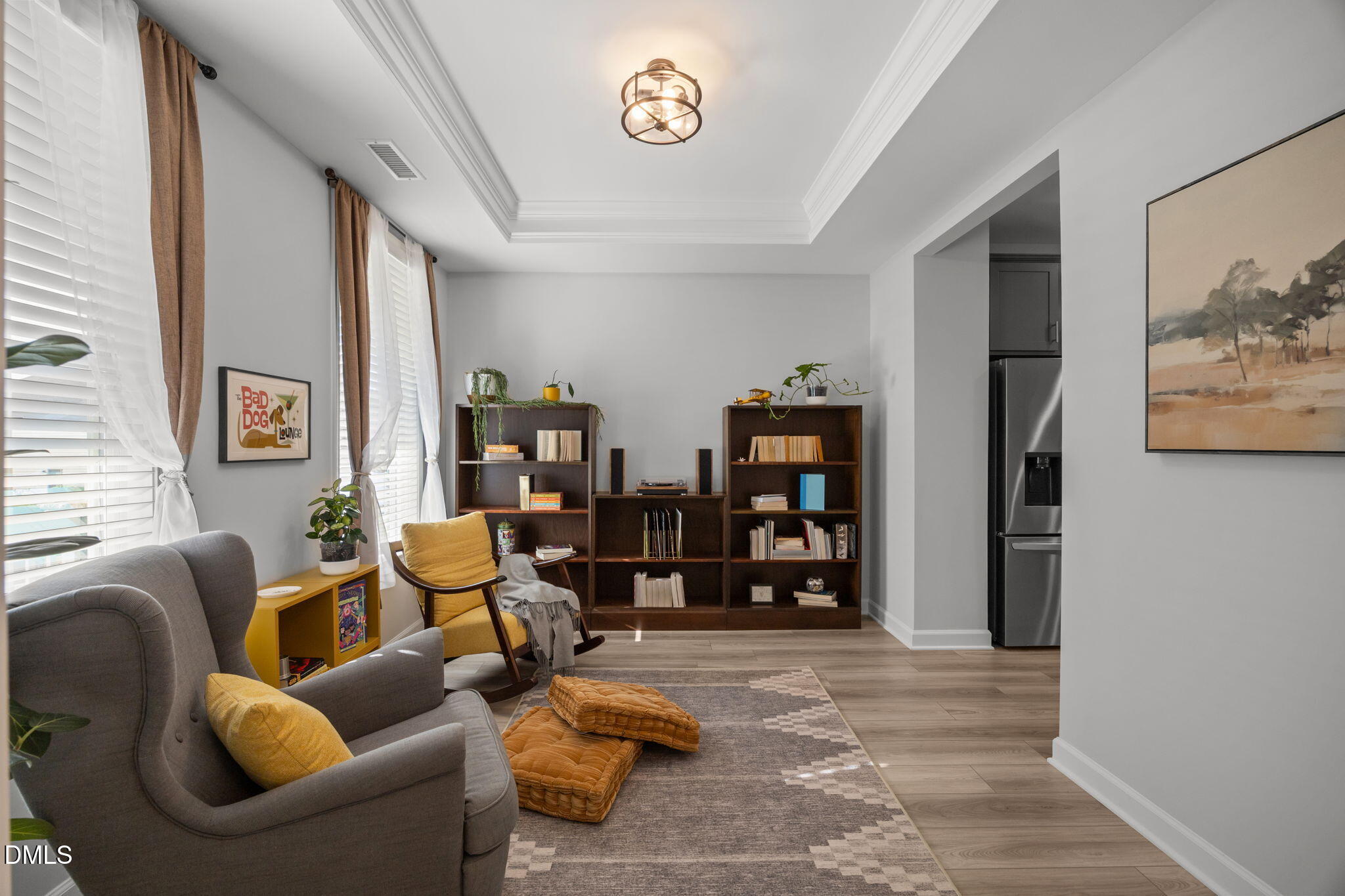 321 Pond Overlook Court Knightdale, NC 27545 - Photo 7 of 41 a living room with furniture and a bookshelf
