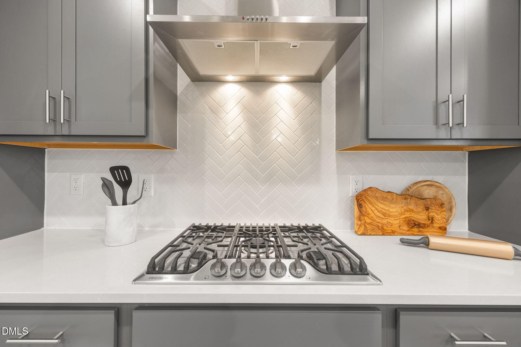 321 Pond Overlook Court Knightdale, NC 27545 - Photo 9 of 41 a kitchen with a sink and cabinets