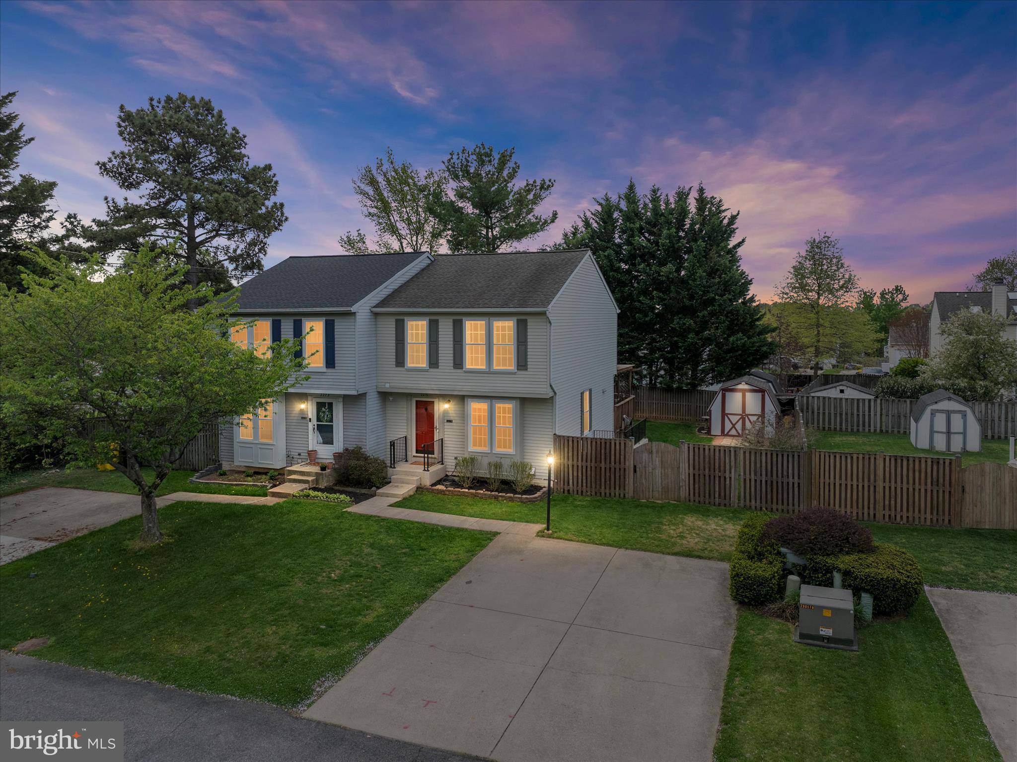 2275 Lea Court Odenton, MD 21113 - Photo 1 of 55 a front view of a house with a garden and yard