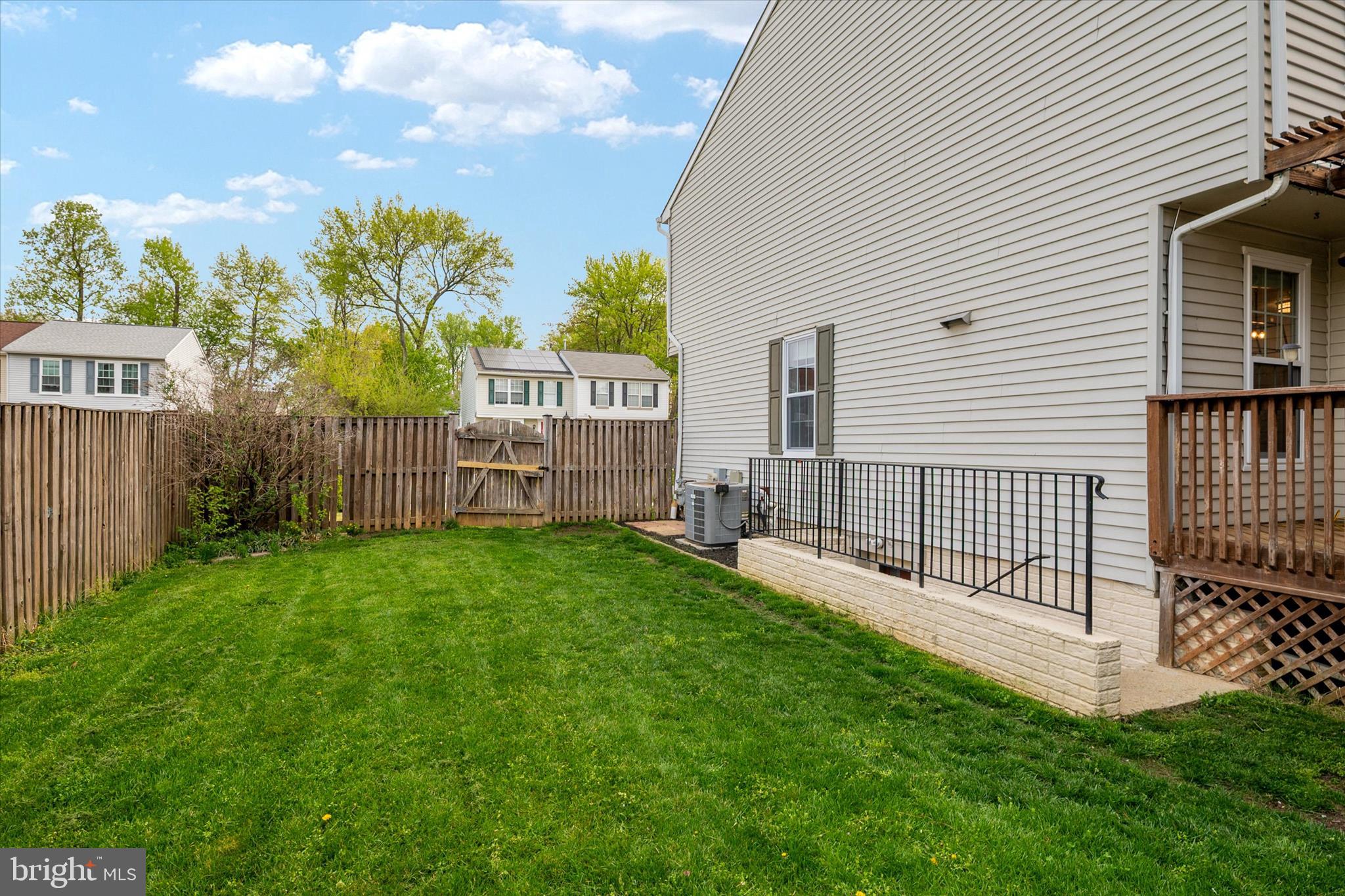 2275 Lea Court Odenton, MD 21113 - Photo 41 of 55 a view of a house with backyard and a garden