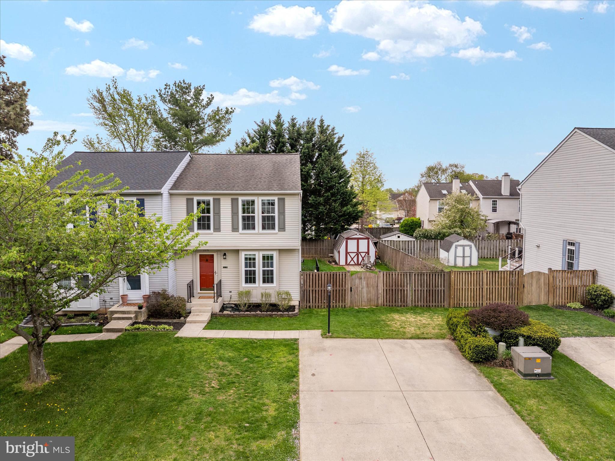 2275 Lea Court Odenton, MD 21113 - Photo 53 of 55 a front view of a house with a yard table and chairs