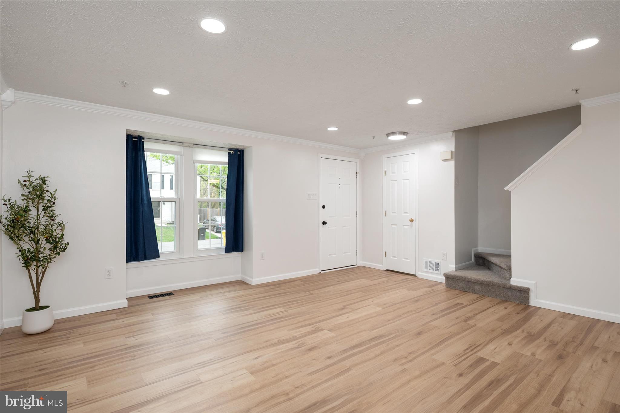2275 Lea Court Odenton, MD 21113 - Photo 7 of 55 wooden floor in an empty room with a window