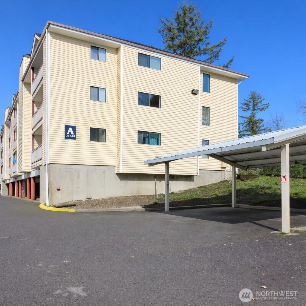 29645 18th Avenue South, Unit A301 Federal Way, WA 98003 - Photo 24 of 24 a view of residential house with wooden fence