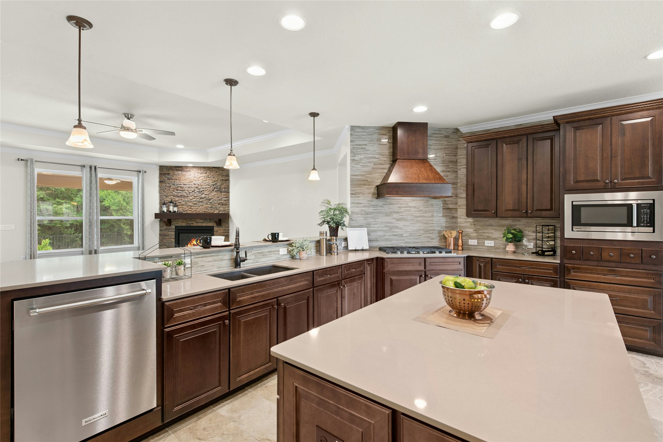 105 Marfa Cove Georgetown, TX 78633 - Photo 36 of 36 a kitchen with stainless steel appliances a sink a stove a refrigerator cabinets and a window