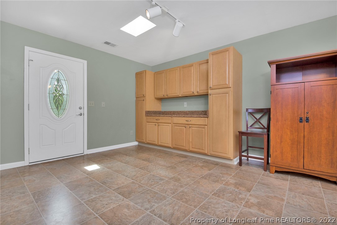 22 Woodridge Lane Cameron, NC 28326 - Photo 22 of 33 a view of an empty room with closet and a window