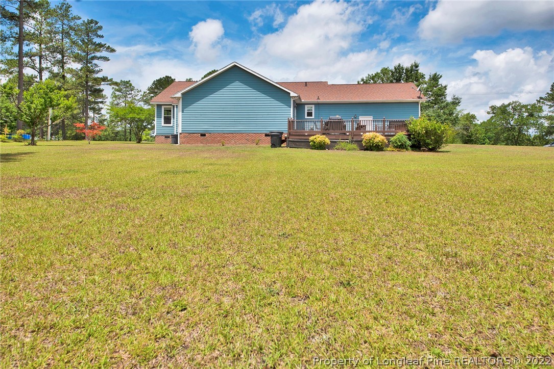 22 Woodridge Lane Cameron, NC 28326 - Photo 24 of 33 a view of a house with a yard