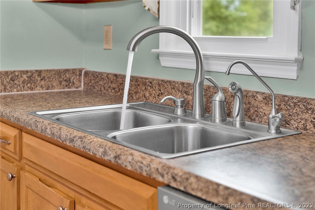 22 Woodridge Lane Cameron, NC 28326 - Photo 28 of 33 a close view of sink and tap