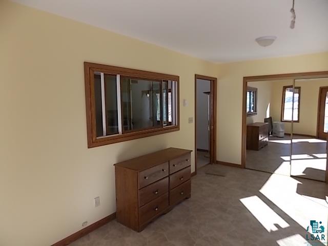 4020 West Arrowhead Road Duluth, MN 55811 - Photo 7 of 22 Four season porch with quality bay window, large closet.