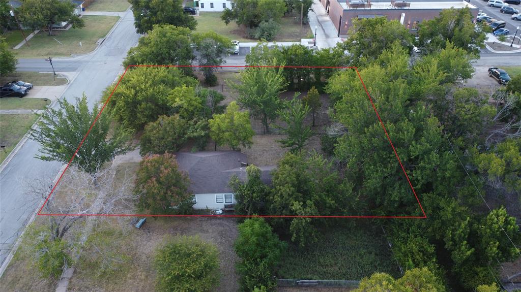 229 South Wilson Street Burleson, TX 76028 - Photo 2 of 16 an aerial view of a house with a yard