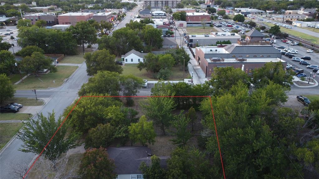 229 South Wilson Street Burleson, TX 76028 - Photo 3 of 16 an aerial view of residential house with outdoor space and trees all around