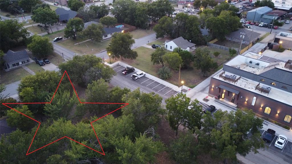 229 South Wilson Street Burleson, TX 76028 - Photo 4 of 16 an aerial view of residential houses with outdoor space and street view