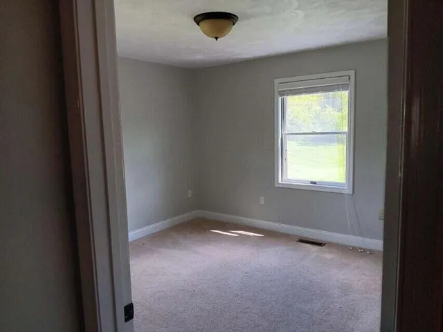 an empty room with a window