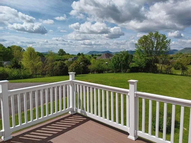 a view of a wooden roof deck