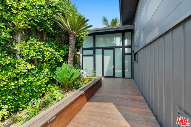 a view of a pathway with a balcony