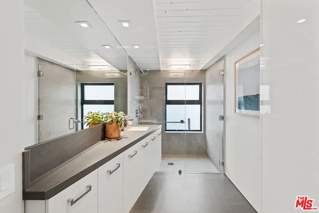 a large white room with a large window