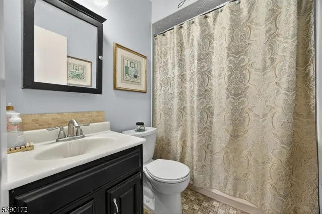 a bathroom with a sink and a toilet