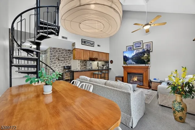 a view of a swimming pool with furniture