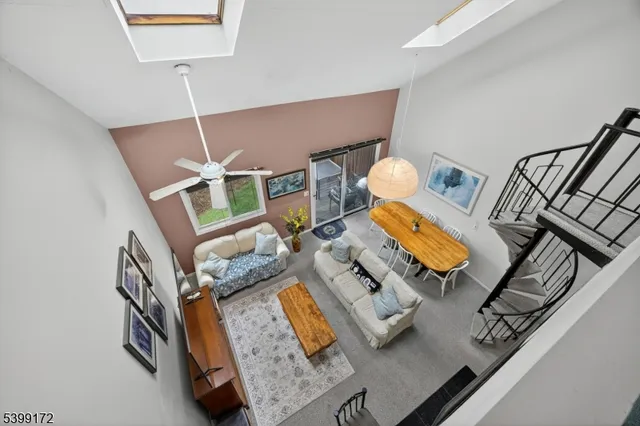 a view of living room with furniture and rug