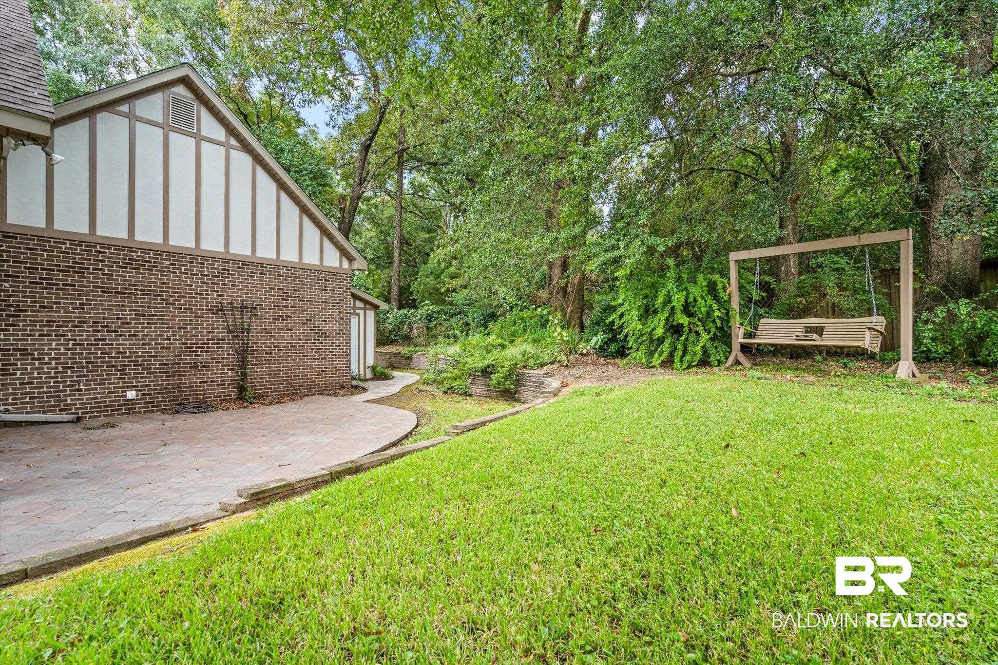 812 Country Club Court Mobile, AL 36609 - Photo 28 of 34 View of yard with a patio