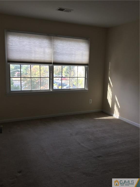 1132 Edpas Road, Unit 1132 New Brunswick, NJ 08901 - Photo 11 of 19 an empty room with a window
