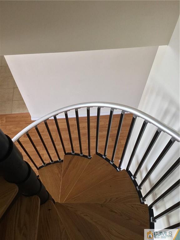 1132 Edpas Road, Unit 1132 New Brunswick, NJ 08901 - Photo 14 of 19 a balcony with stairs